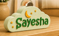 Personalized cloud-shaped piggy bank with name Sayesha, moon and star accents